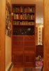 Lee & Sons Woodworkers, Inc.: Stereo and bookcase incorporated into custom kitchen